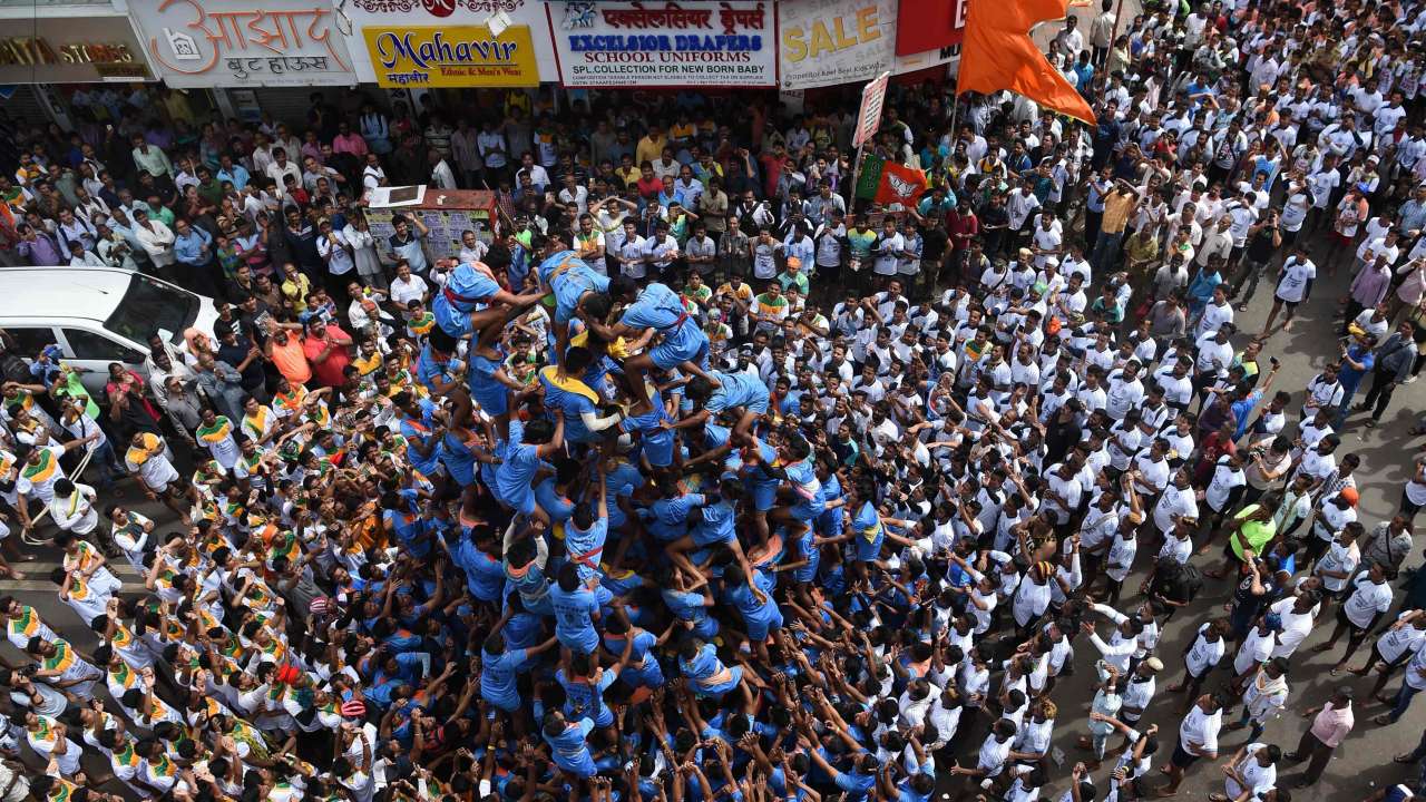 Hindu devotees form a human pyramid