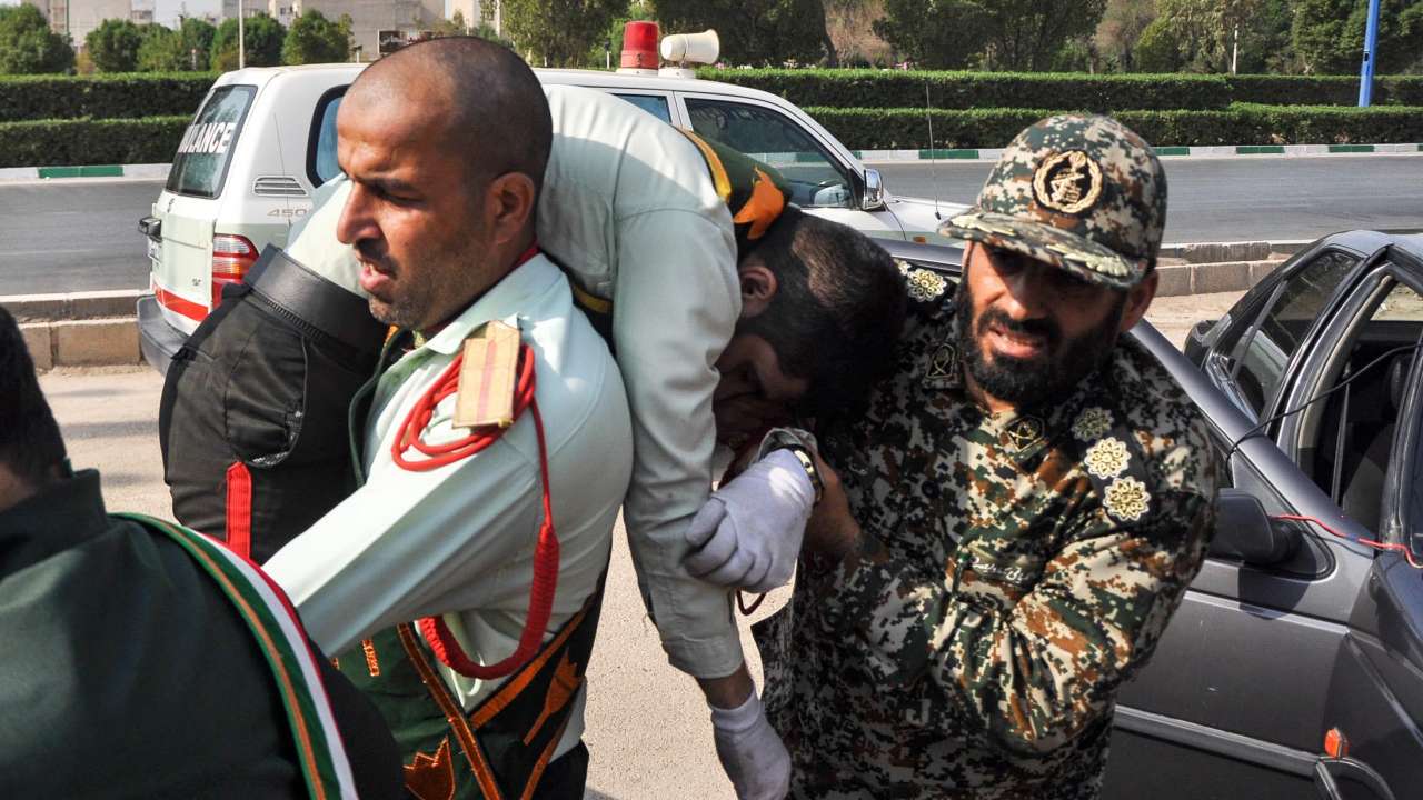 Soldier carrying an injured comrade