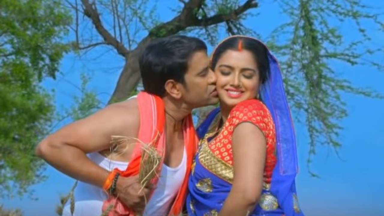 Bhojpuri Amrapali Sexy Bf Video Download - Watch: Bhojpuri bombshell Amrapali Dubey romances 'Nirahua' Dinesh Lal  Yadav in a barn, song goes VIRAL!