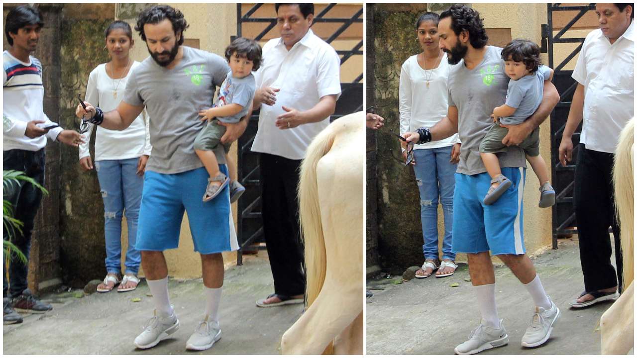 Saif's arms: restful place for Taimur