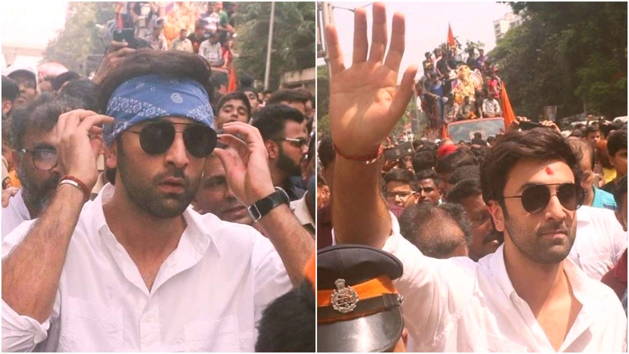 Bollywood actor Randhir Kapoor, Ranbir Kapoor, wearing black raincoat,  celebrating participating in Ganesh Festival procession in Mumbai India  Stock Photo - Alamy