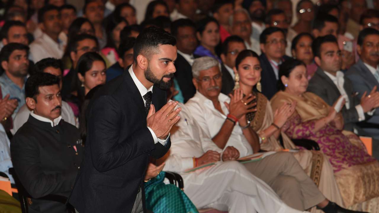 Kohli greets the president