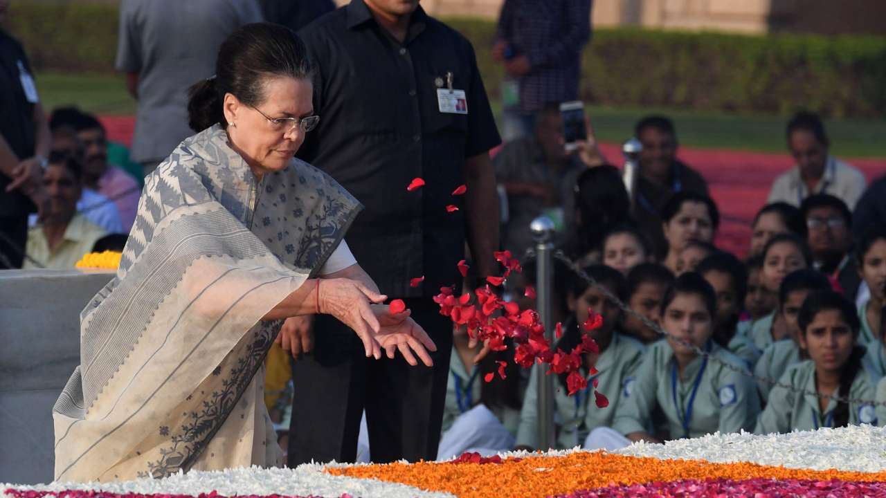 Sonia Gandhi sprinkles rose petals to pay tribute to Mahatma Gandhi