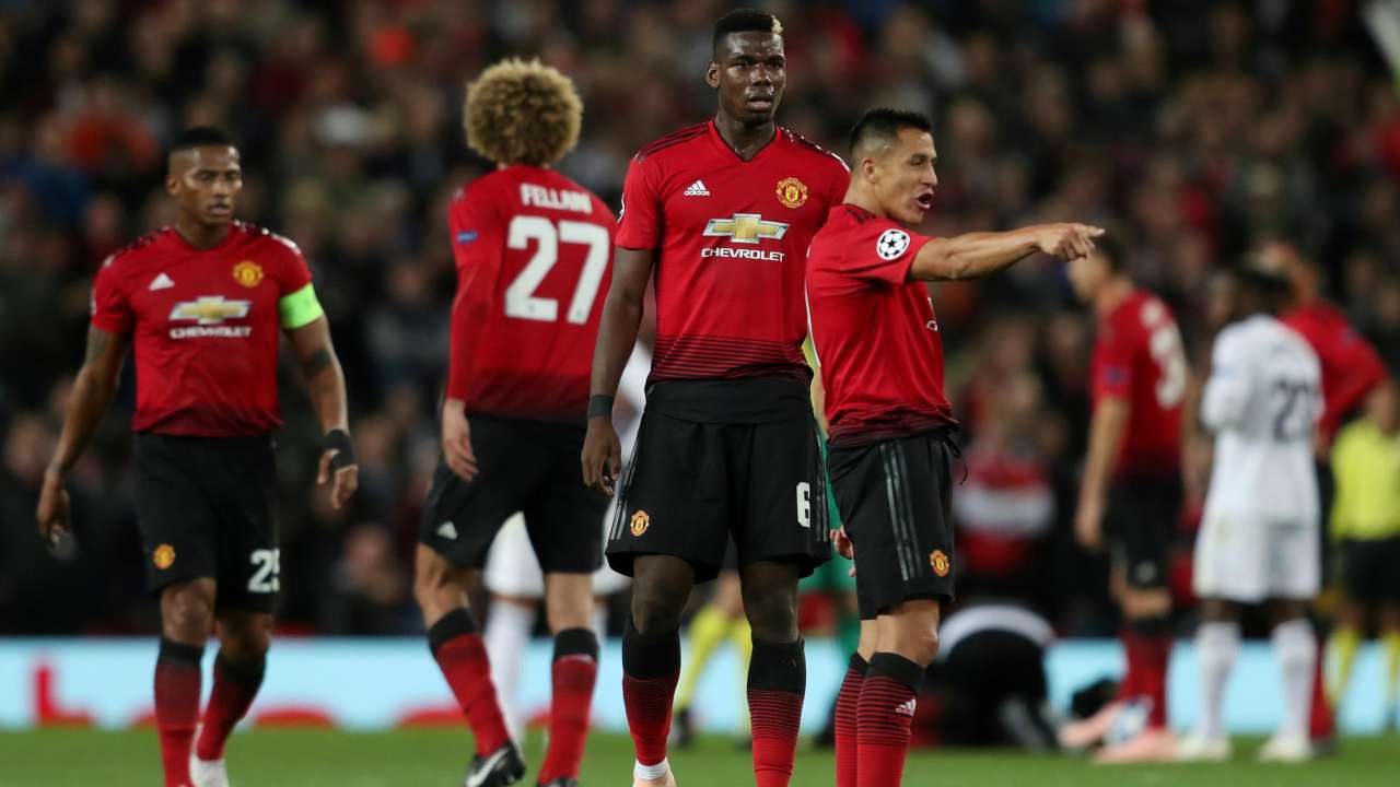 Manchester United players in action against Valencia Manchester United players in action against Valencia