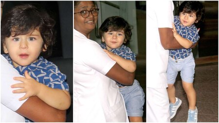 Look how glad baby Taimur is on spotting his paparazzi friends!