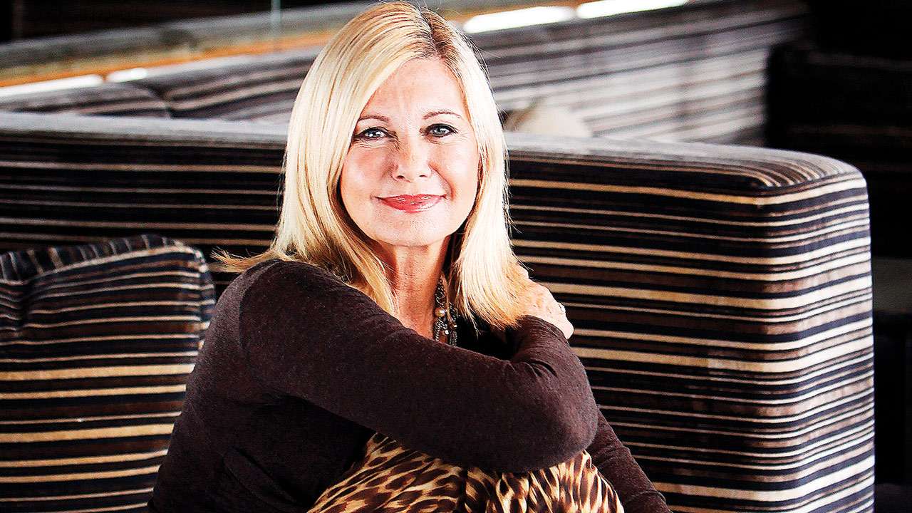 MONTHLY BREAST SELF-EXAMS ARE VITAL: OLIVIA NEWTON-JOHN