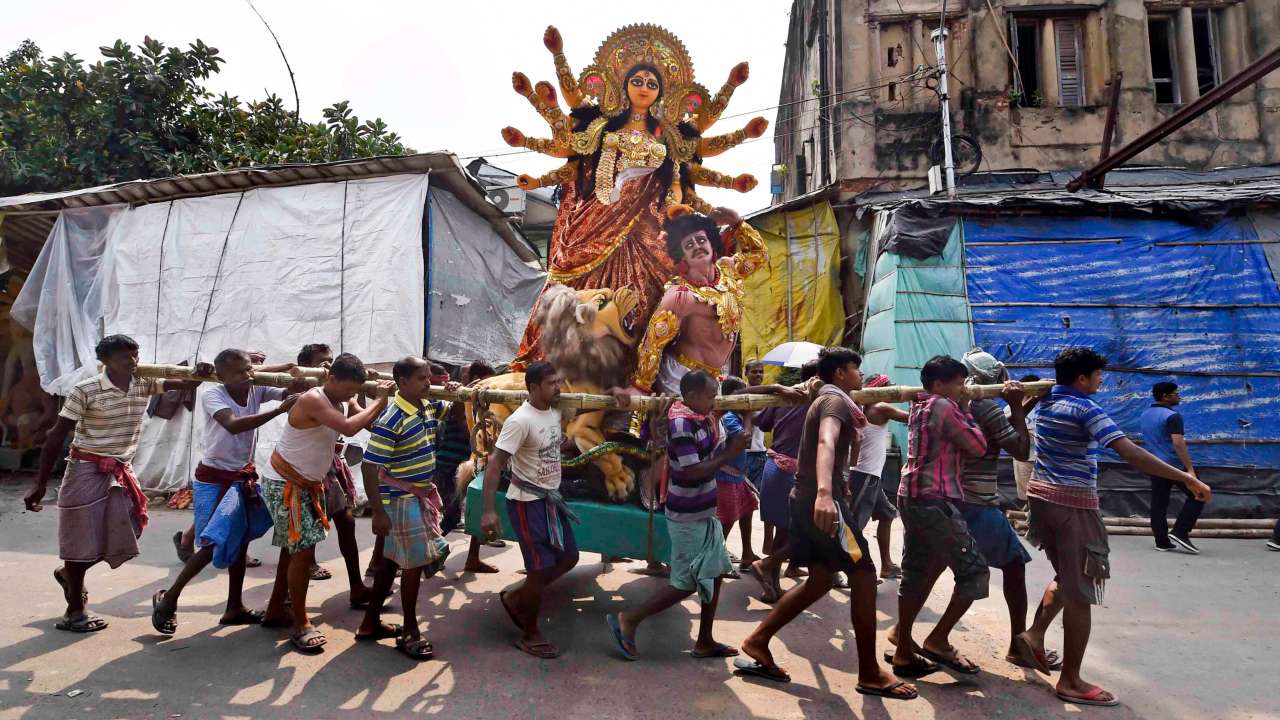 Durga idol being taken to pandal