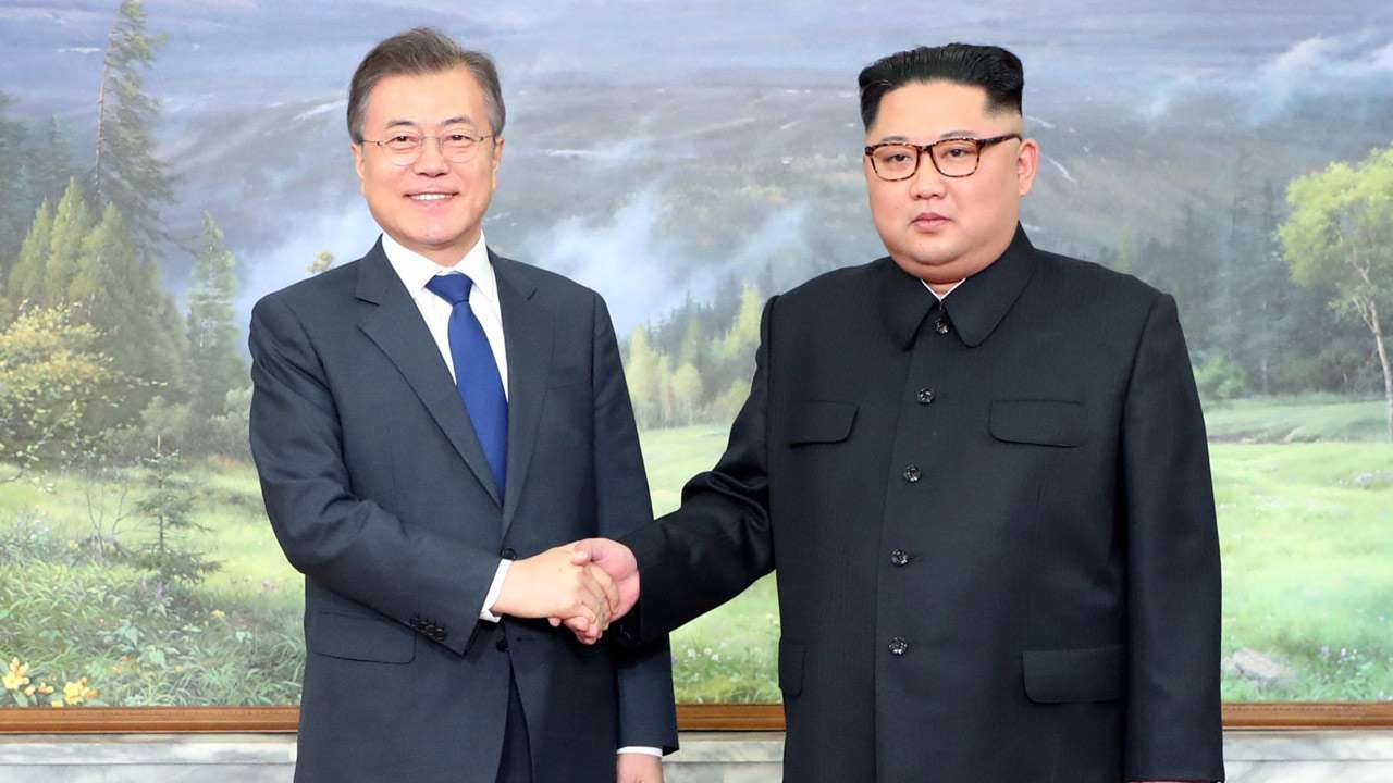 moon-jae-in-kim-jong-un-reuters