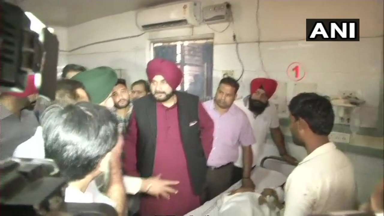 Punjab tragedy: sidhu visits injured in amritsar hospital, defends wife