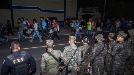 Migrants take part in a new caravan