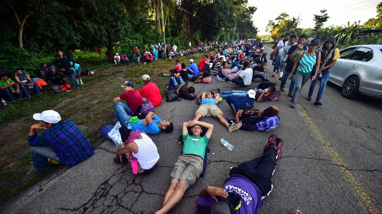 In Pics: Caravan Of Thousands Of Immigrants Cross Mexico Border, Trump ...