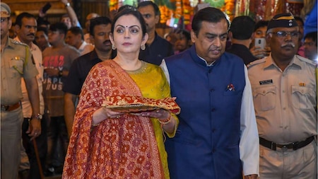 Mukesh Ambani and Nita Ambani arrive at Siddhivinayak Temple