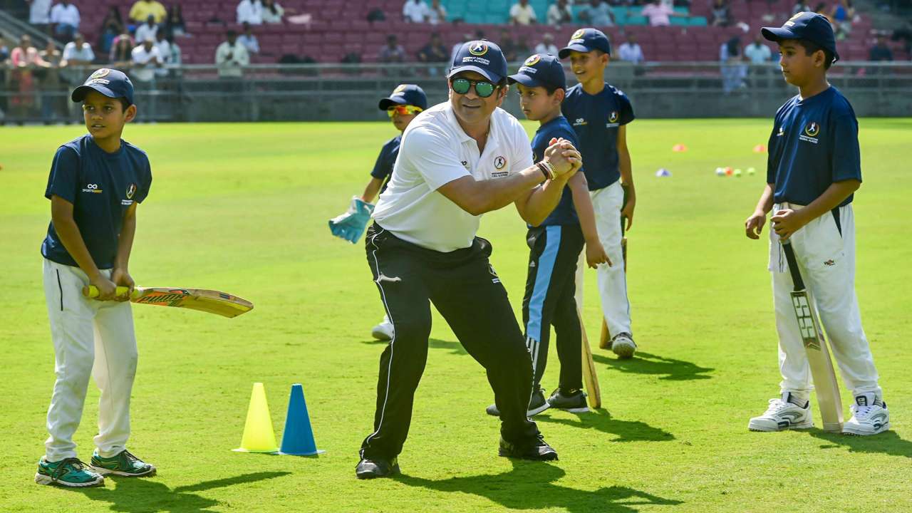 Sachin Tendulkar gives tips to young cricketers under the Tendulkar Middlesex Global Academy in Mumbai on Thursday