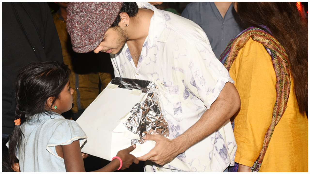 Celebrating by giving away food to the underprivileged