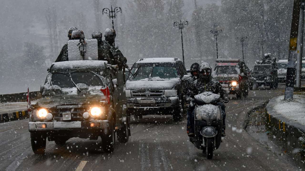 Tourists during season's first snowfall