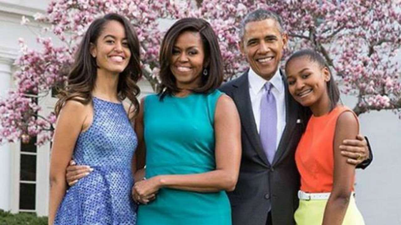 Michelle Obama with husband Barack, and their daughters