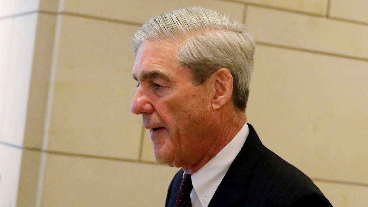 Special Counsel Robert Mueller departs after briefing the US House Intelligence Committee 