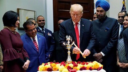 Trump lights the diya on the Diwali lighting ceremony