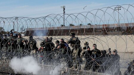 US soldiers fire tear gas