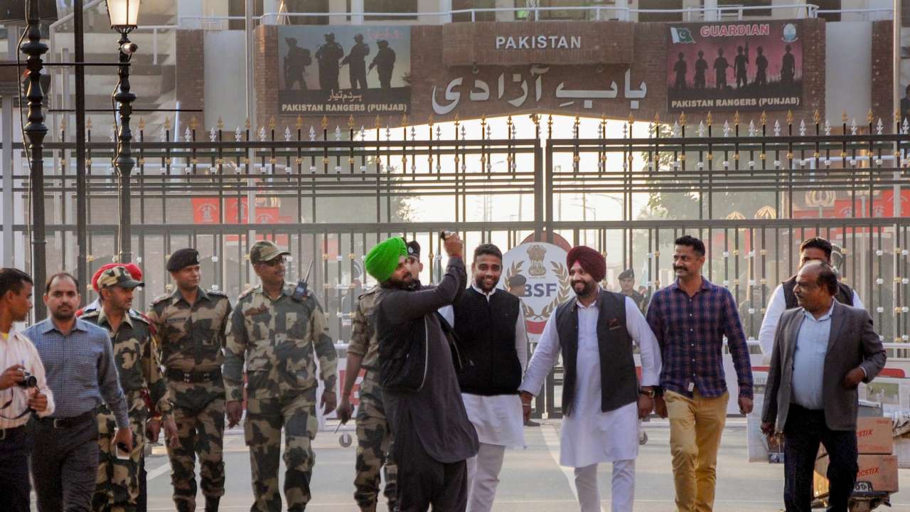Sidhu crossing the border into Pakistan