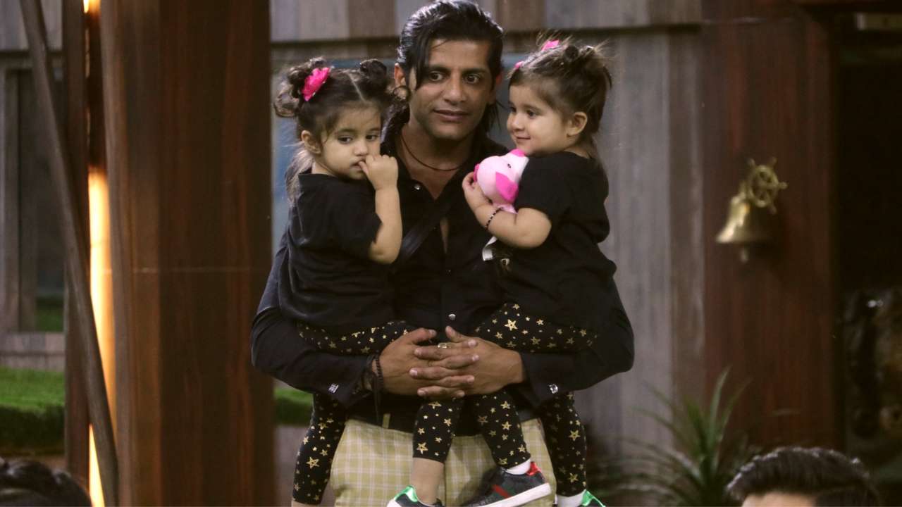 Karanvir's twins refuse to let go of their father's hand