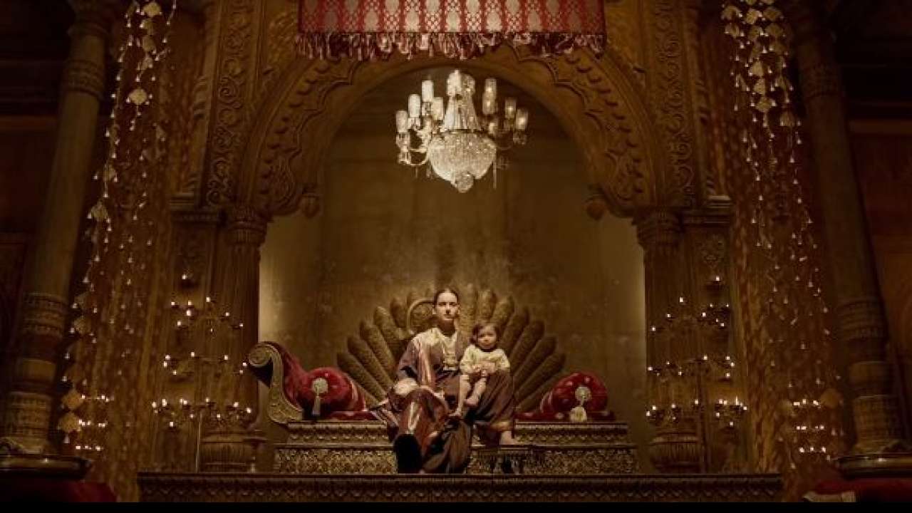 Sivagami sitting with her child in Baahubali: The Beginning