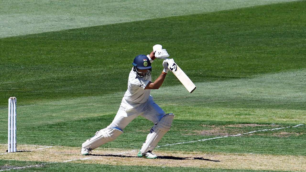 Pujara gets 21st Test fifty