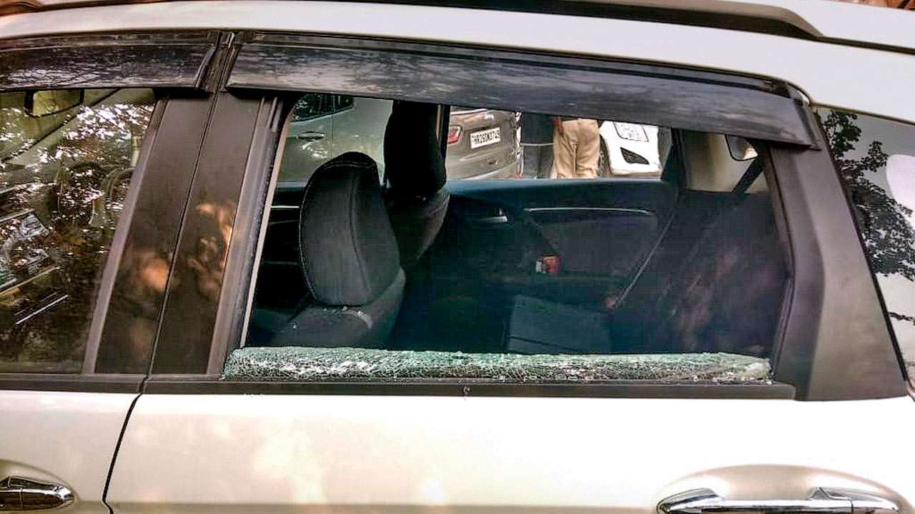 Robbers shattered a window