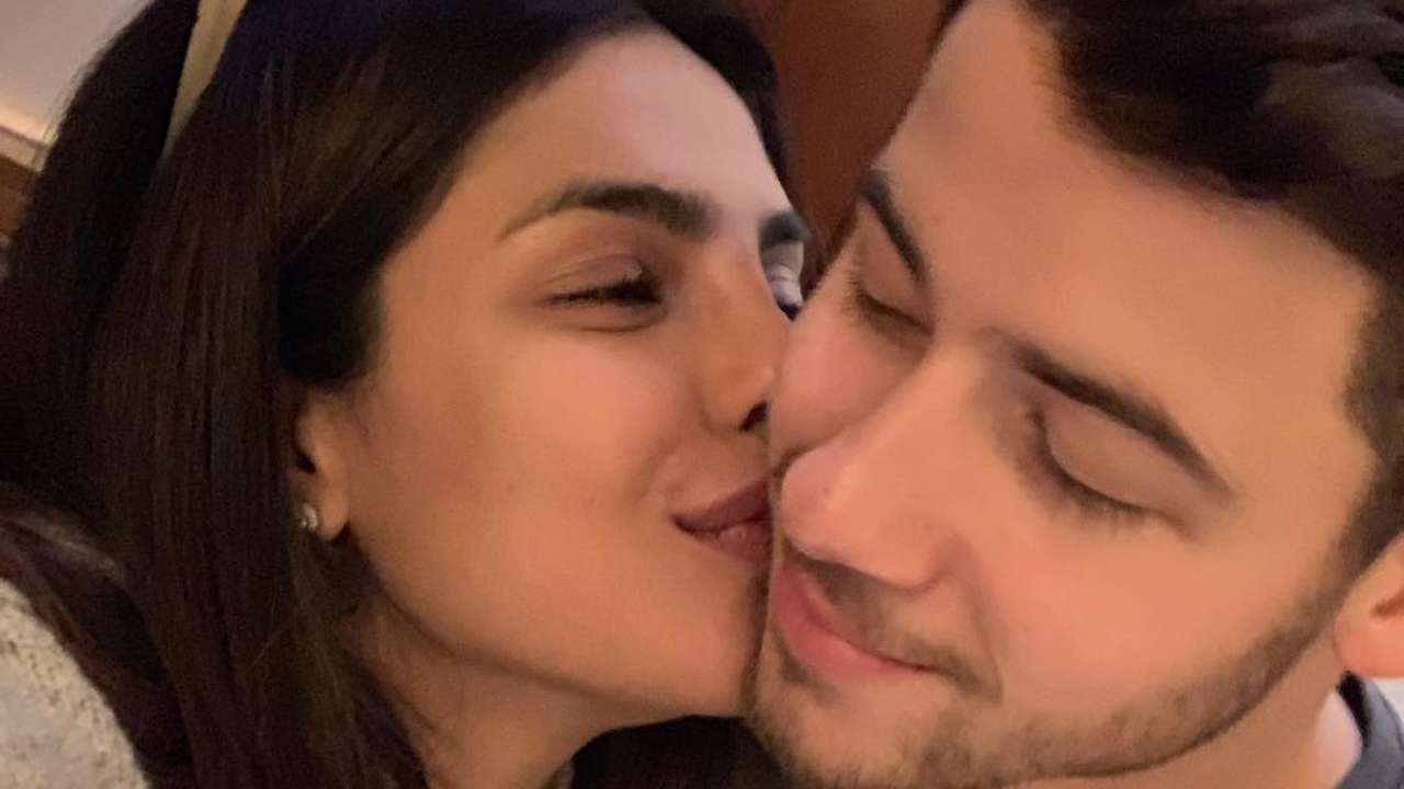 Kissing the most stylish man