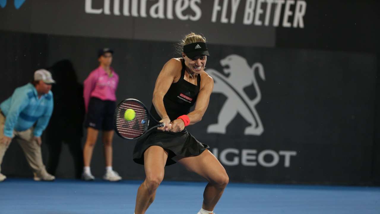 Angelique Kerber plays a shot to Camila Giorgi during their womens second round match at Sydney International tennis tournament