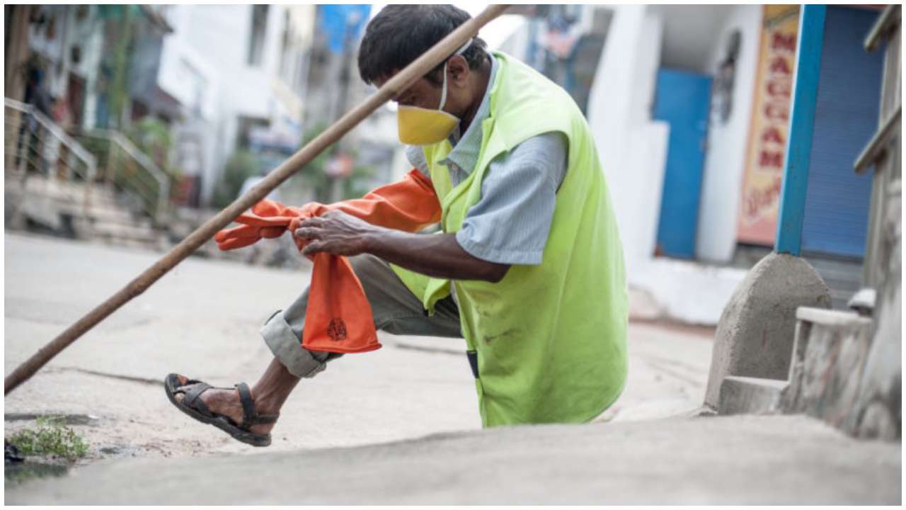 Sanitation workers climb tower over pending wages in Noida
