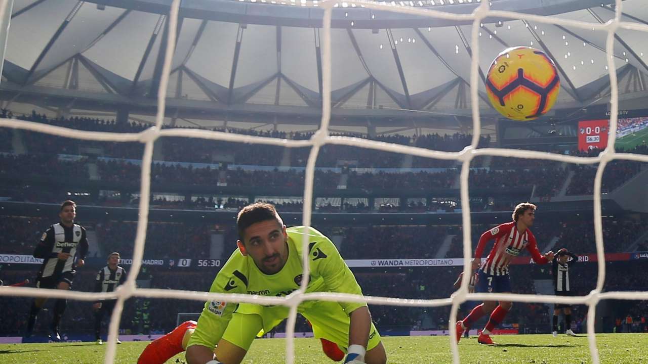 Antoine Griezmann scores the first goal from penalty spot
