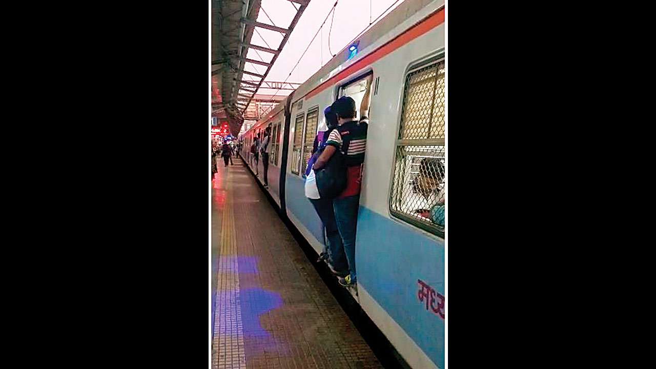 Mumbai Blue Indicators On Local Train Doors To Prevent