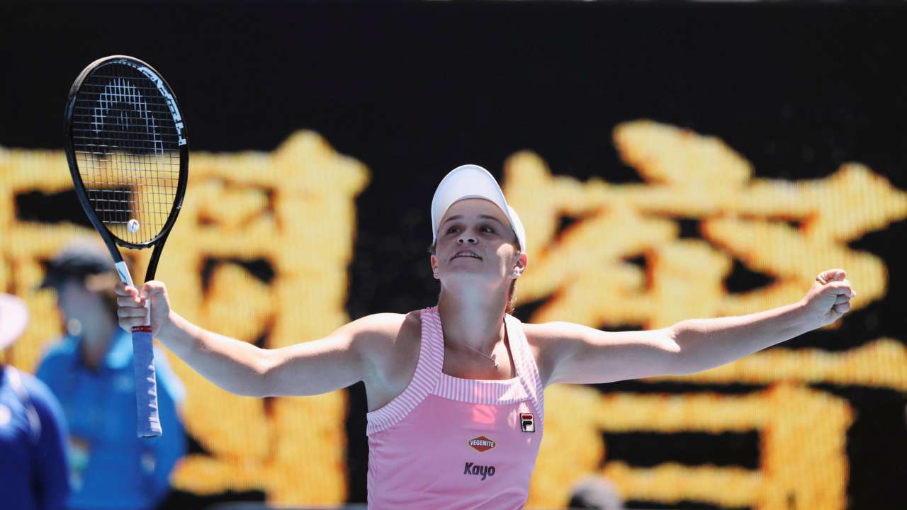 Ashleigh Barty celebrates winning the match against Maria Sharapova