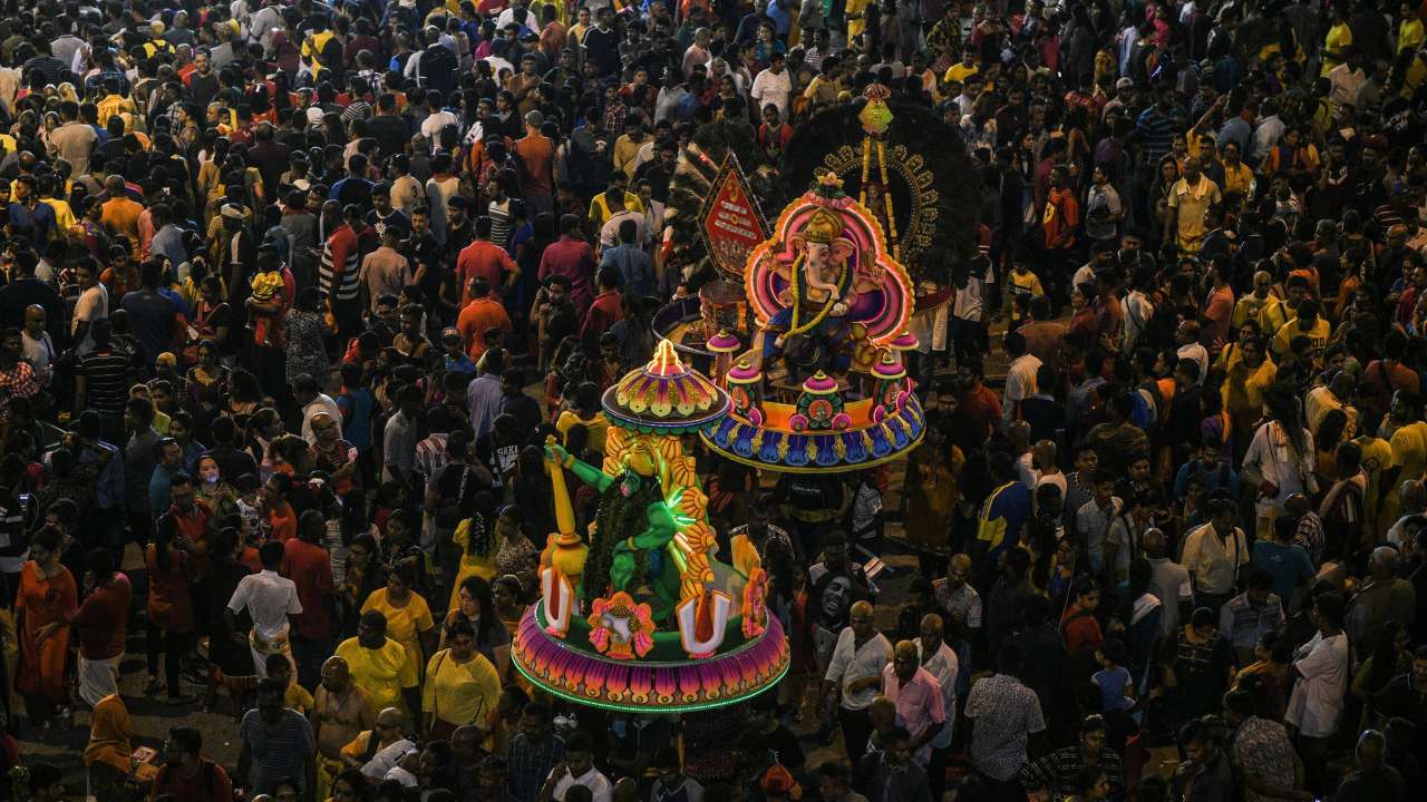 Devotees Making Their Pilgrimage To A Batu Caves Temple