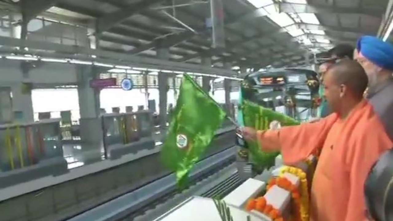 (UP CM Yogi Adityanath flags off first Aqua line metro train)