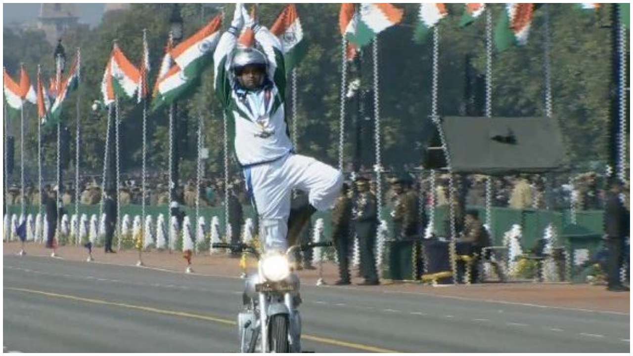 Motorcyclist performing Yoga