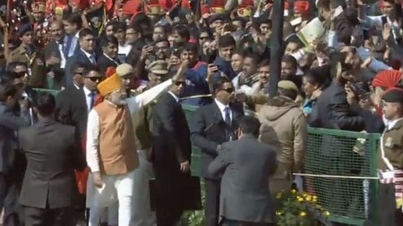 PM Modi greets the crowd