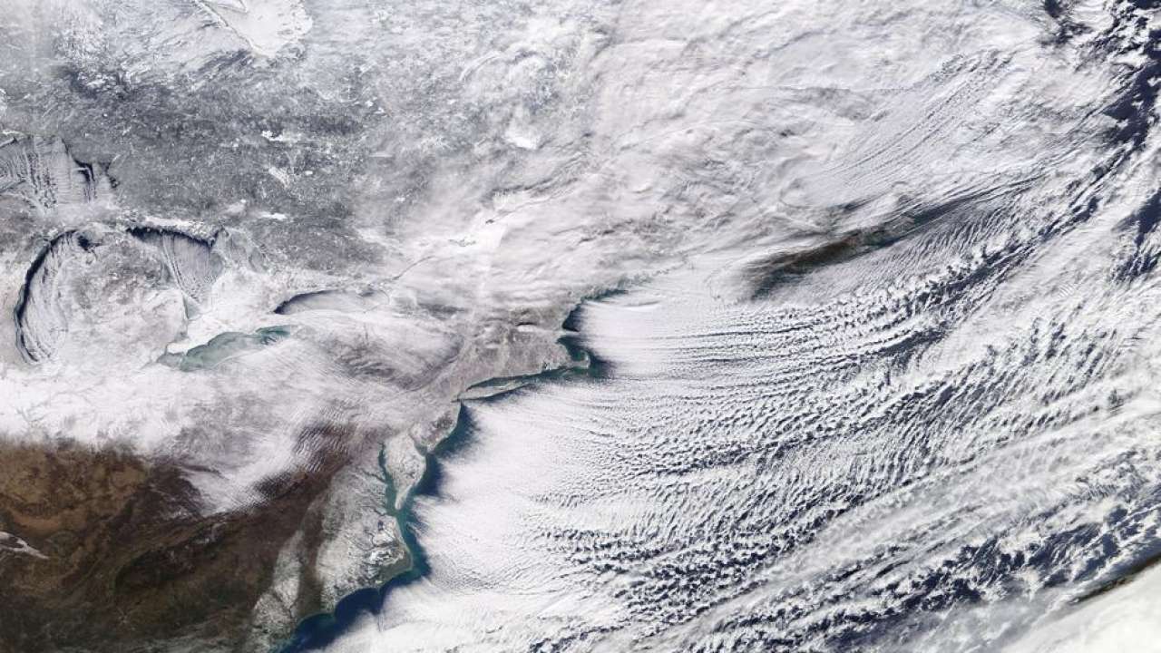 At least 12 dead as arctic freeze spreads into US Northeast