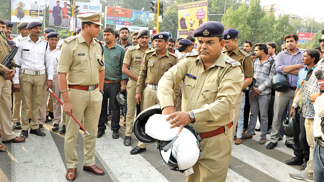 Wear helmets for safety, not to escape fine: Ahmedabad Traffic police