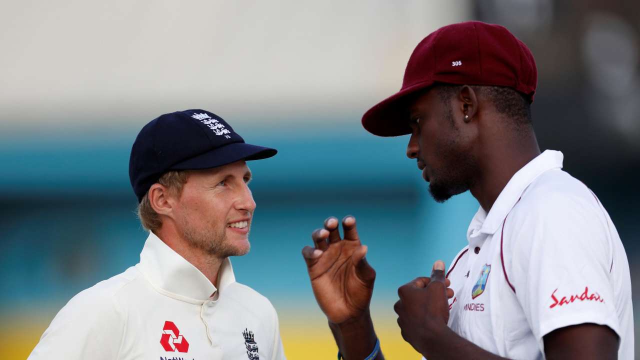 Joe Root and Jason Holder