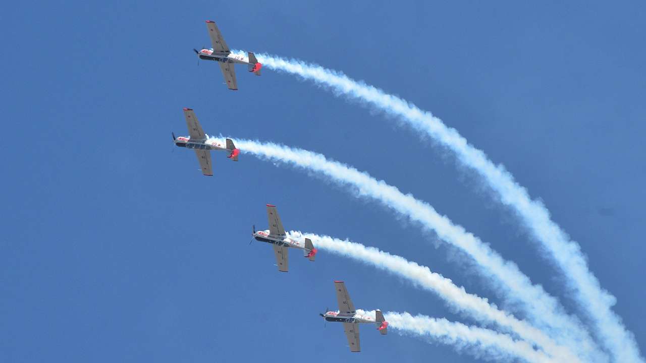 Aerobatics team performs during a flying display