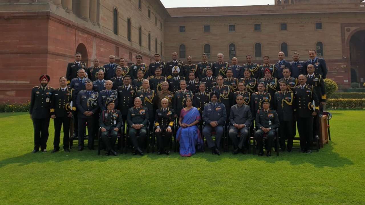 Defence Minister with the service chiefs and attaches