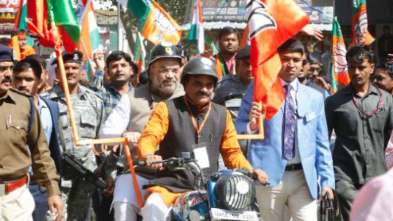 (Amit Shah at BJP's 'Vijay Sankalp' bike rally) 