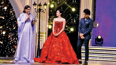 Sonam K Ahuja received her award for Extraordinary Icon for Social Change as Janhvi Kapoor and Ishaan Khatter looked on