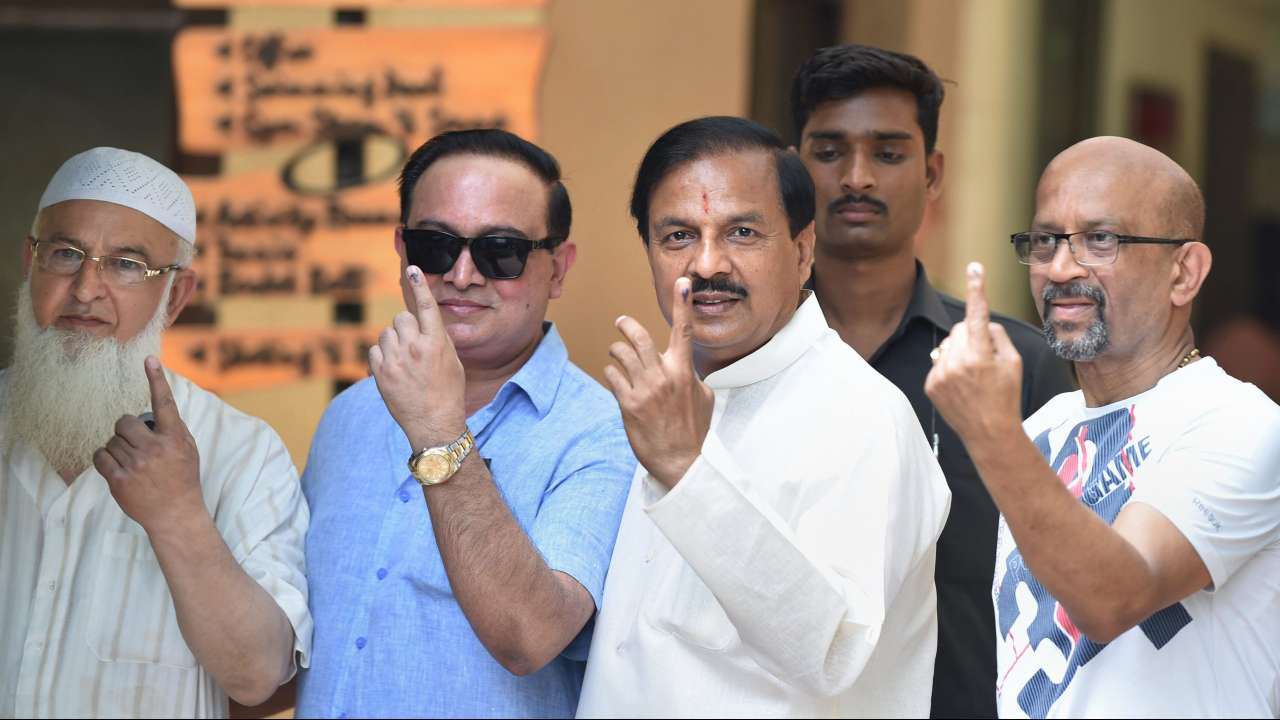 Voters including Dr Mahesh Sharma 
