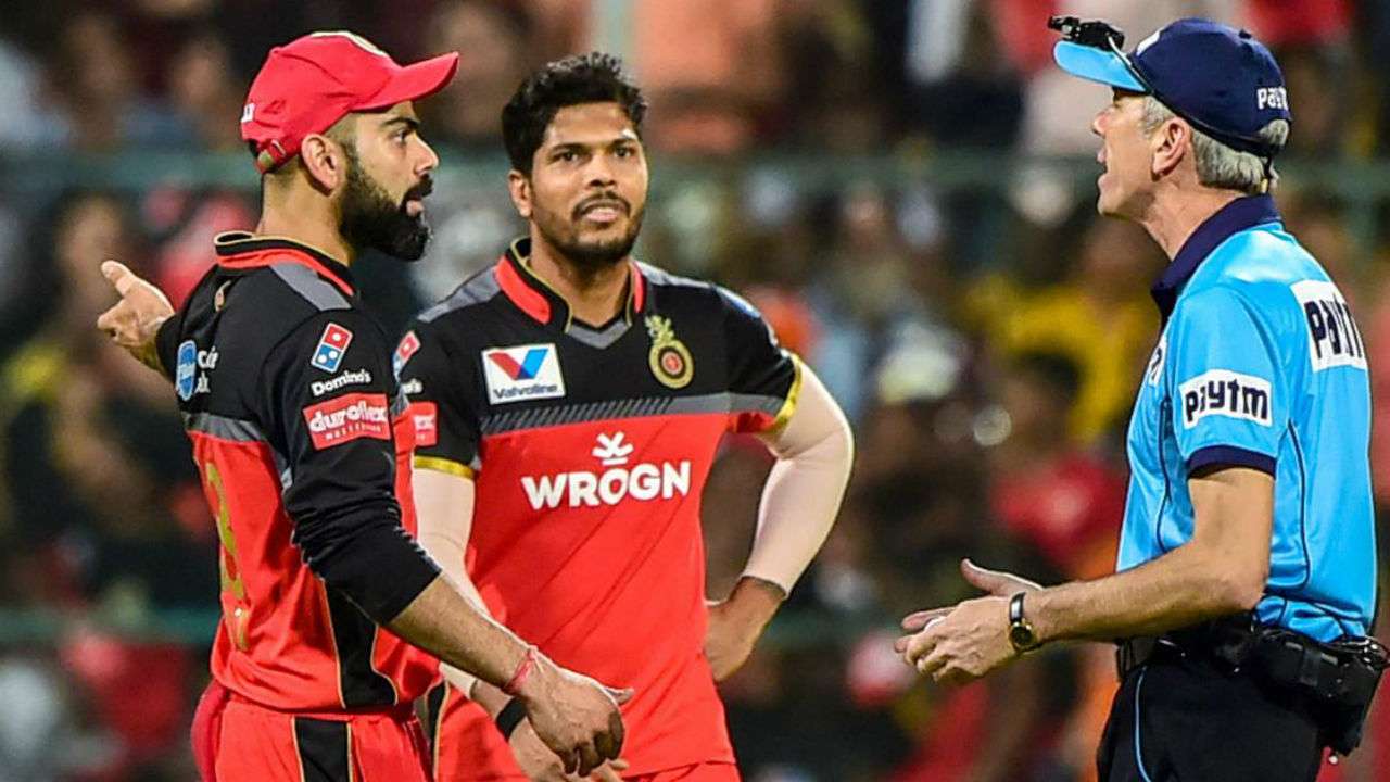 Virat Kohli and Nigel Llong