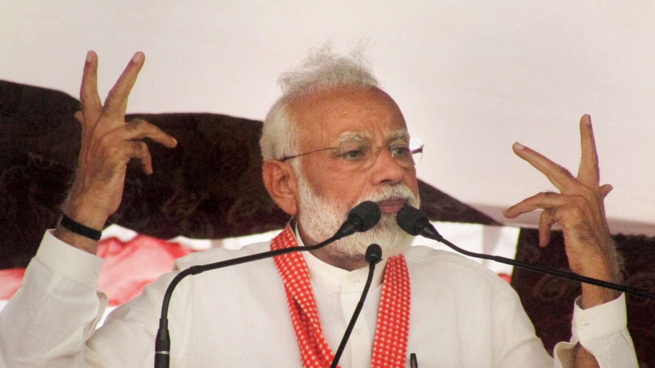 Prime Minister Narendra Modi addresses during an election campaign rally for the Lok Sabha polls, in Sonbhadra