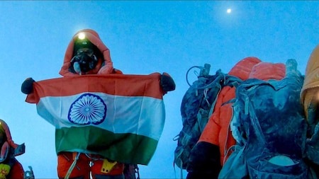 IAS officer Ravindra Kumar represents India and its real issues at the top of Mt. Everest