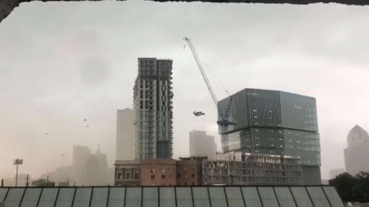 US: Crane collapses during storm in Dallas, killing 1 woman